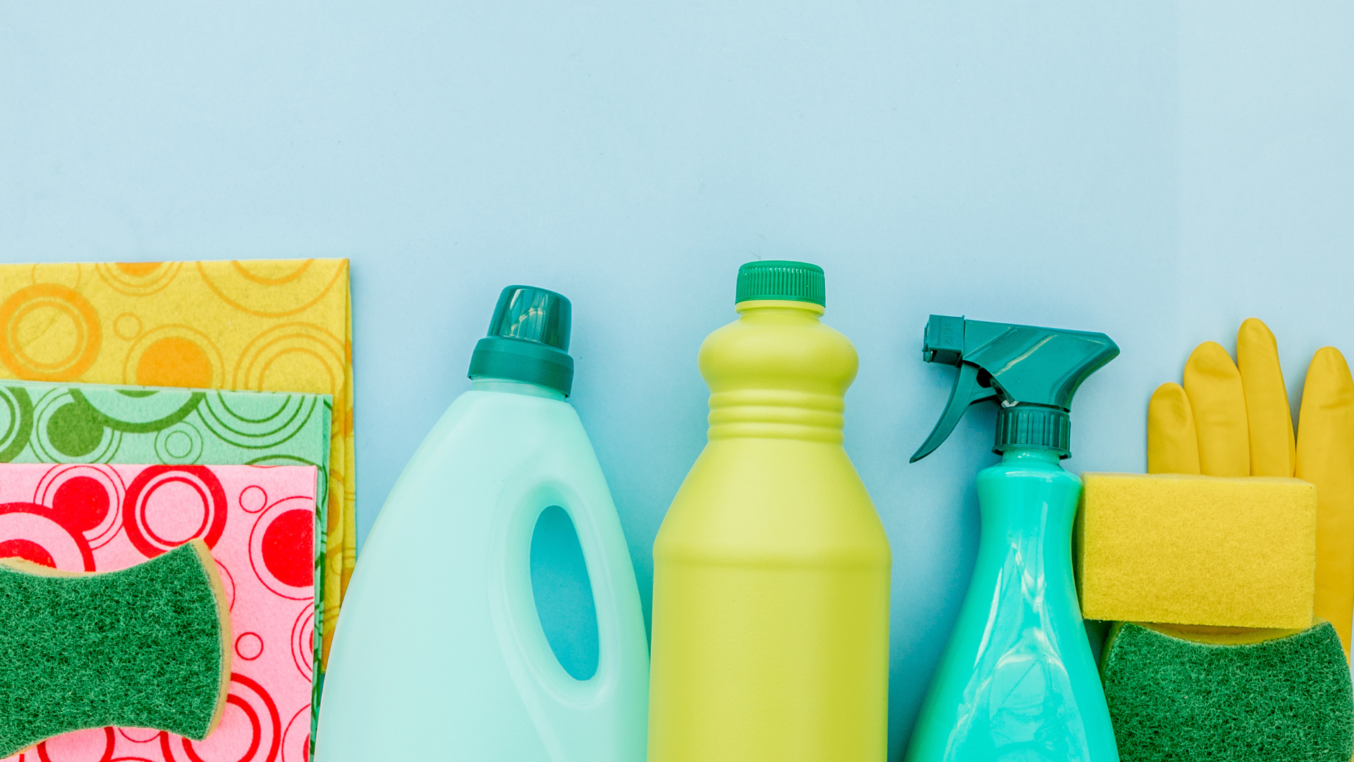 Various cleaning products, including bleach, and materials to clean with, on a blue background.