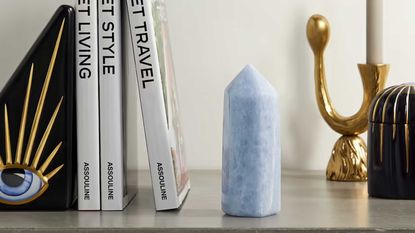 a blue crystal on a shelf