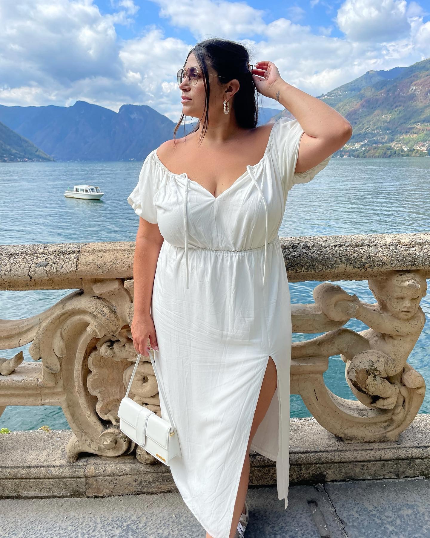 Plus size bride wearing white dress in Lake Como.