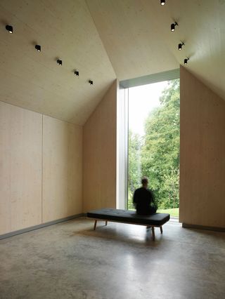 Ditchling Museum of Art + Craft, person sitting in a window in a large room