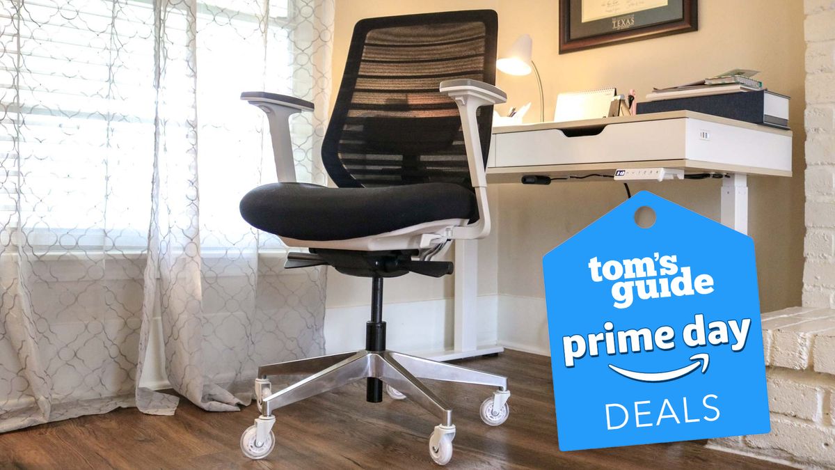 The Branch Ergonomic Chair next to a desk with a Tom&#039;s Guide Prime Day deals badge