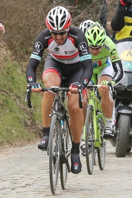 Fabian Cancellara (RadioShack Leopard) drives the pace with Peter Sagan and Jurgen Roelandts in tow.