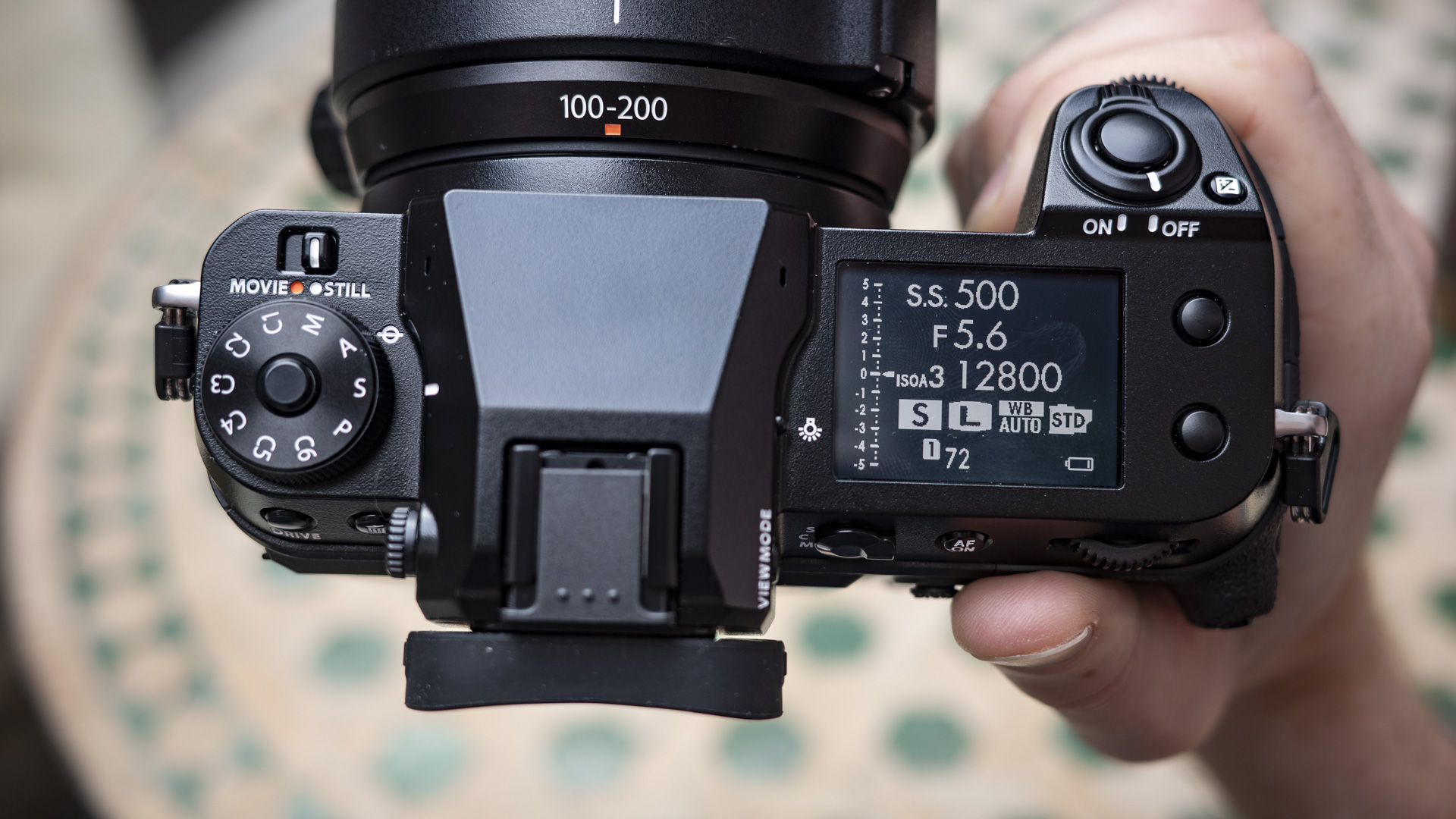 Fujifilm GFX100S II camera in the hand