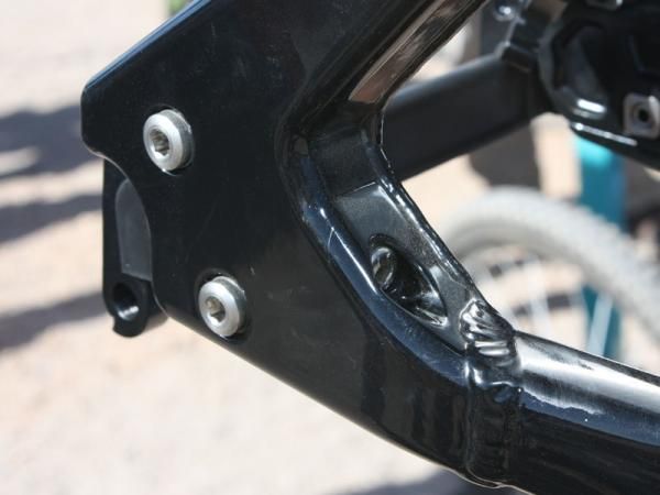 Dropout adjusters are neatly integrated into the box-section dropouts.