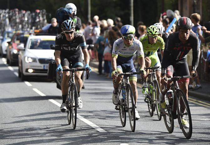 Ben Swift and Adam Blythe far right ride the final 30km