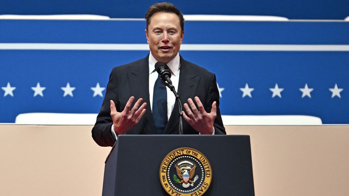 Tesla and SpaceX CEO Elon Musk gestures as he speaks during the inaugural parade inside Capital One Arena, in Washington, DC, on January 20, 2025. (Photo by ANGELA WEISS / AFP) (Photo by ANGELA WEISS/AFP via Getty Images)