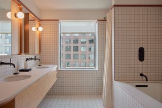 White tiled bathroom at ace toronto hotel