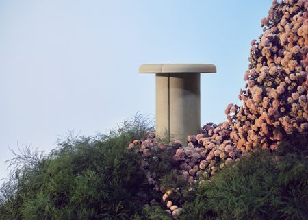 an outdoor table made from plastic waste