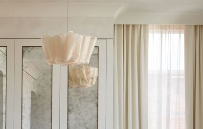layered sheer curtains and blackout curtains
