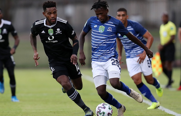 Sibusiso Hlubi of Maritzburg United challenged by Thulani Hlatshwayo of Orlando Pirates