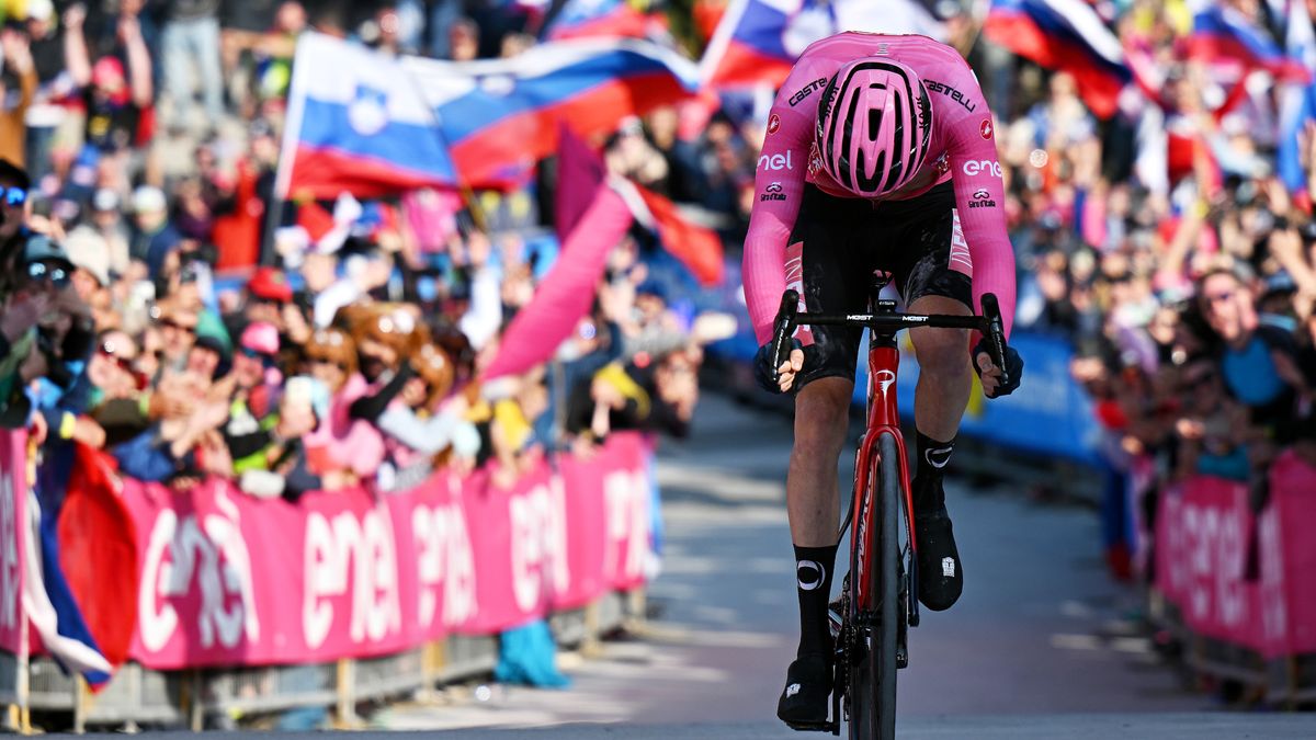 Geraint Thomas crosses the line in the pink jersey at the Giro d&#039;Italia