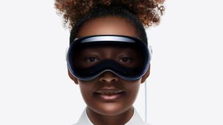 Apple Vision Pro marketing image showing a user and their eyes through the headset