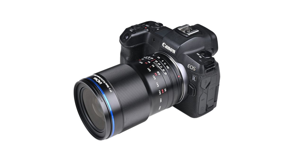 Laowa Acris 35mm f/2.8 1x Macro Apo lens mounted to a camera against a white background