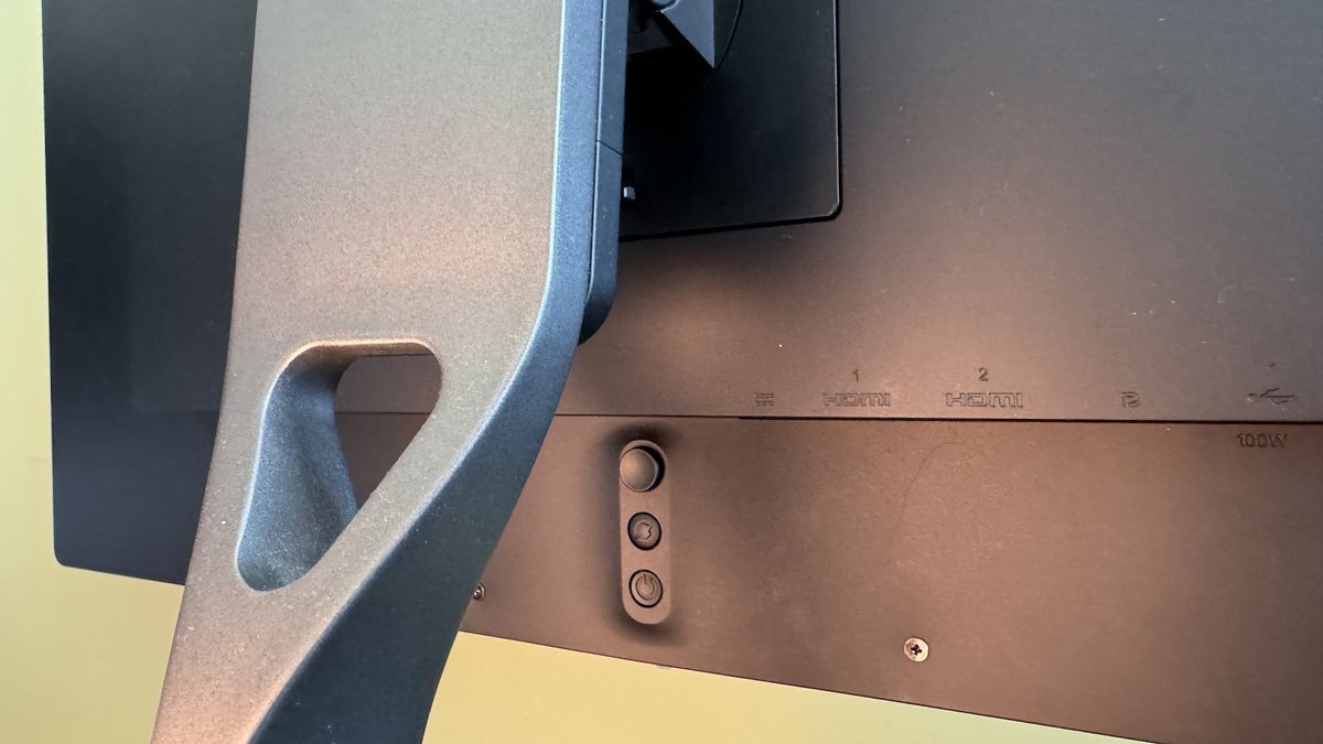 Dough Spectrum Black 27-inch OLED monitor on a desk in a home office.