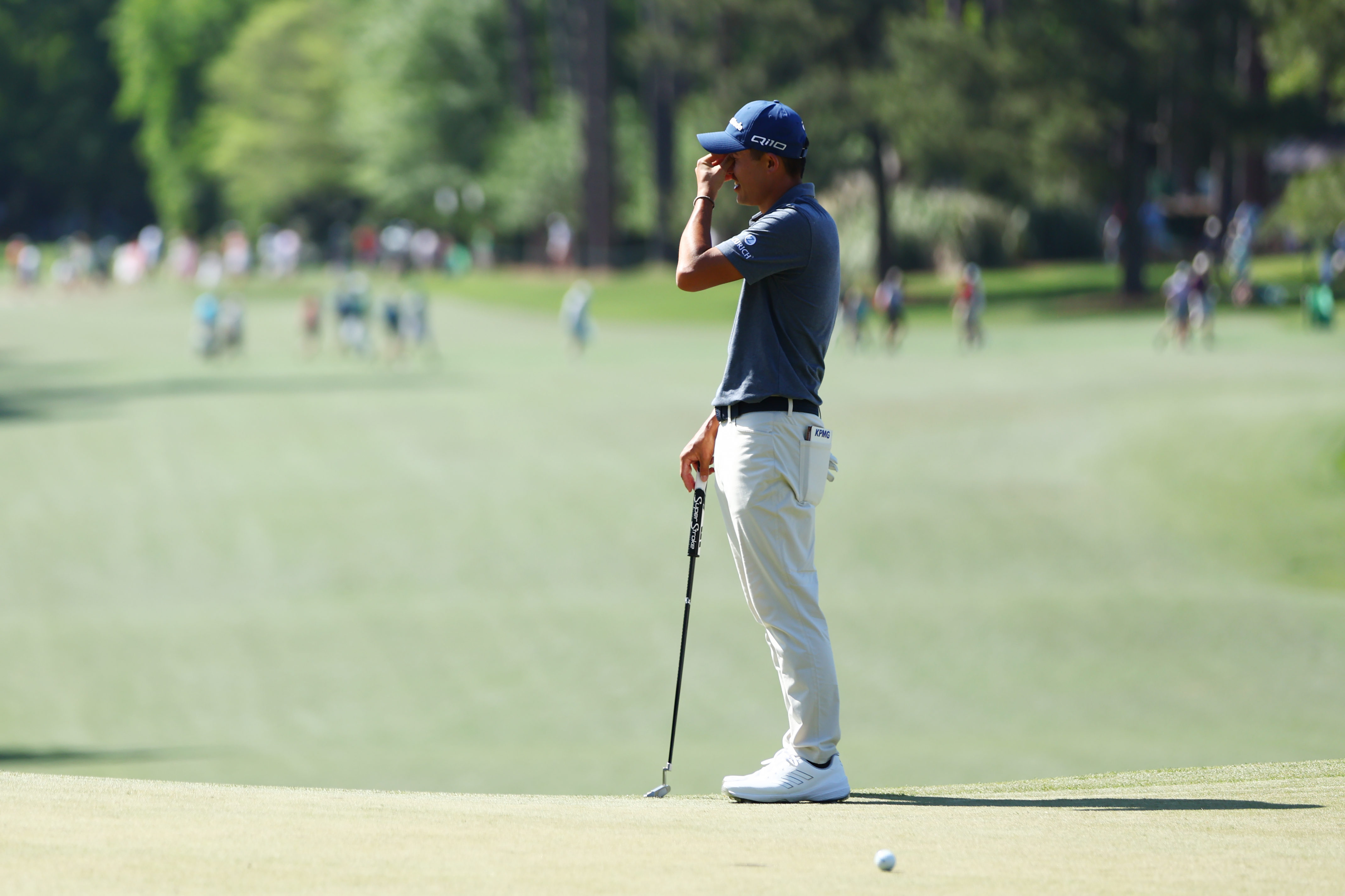 Collin Morikawa reacts to a missed putt at The Masters