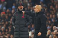 MANCHESTER, ENGLAND - DECEMBER 22: Liverpool Manager Jurgen Klopp reacts to Manchester City Manager Pep Guardiola during the Carabao Cup Fourth Round match between Manchester City and Liverpool at Etihad Stadium on December 22, 2022 in Manchester, England. (Photo by Chris Brunskill/Fantasista/Getty Images)