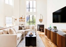 a white living room with modern furniture