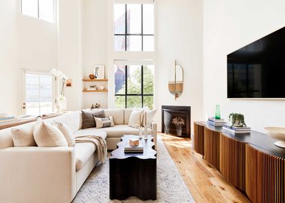 a white living room with modern furniture
