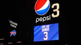 Buffalo Bills fans attend a candlelight prayer vigil for player Damar Hamlin at Highmark Stadium on January 3, 2023 in Orchard Park, New York. Hamlin collapsed after making a tackle last night on Monday Night Football.