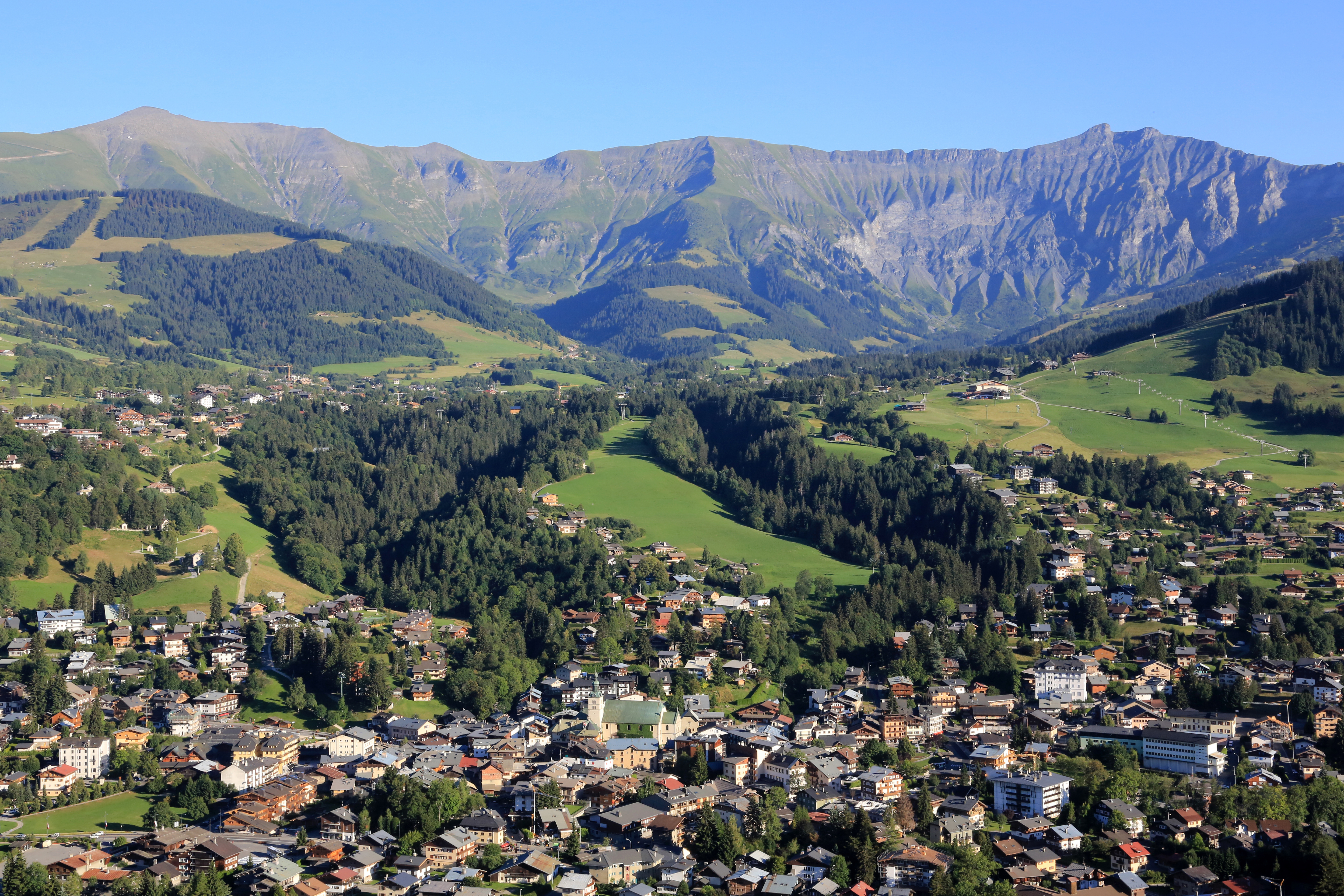 The aerial view of Megeve, France and its surrounding mountains