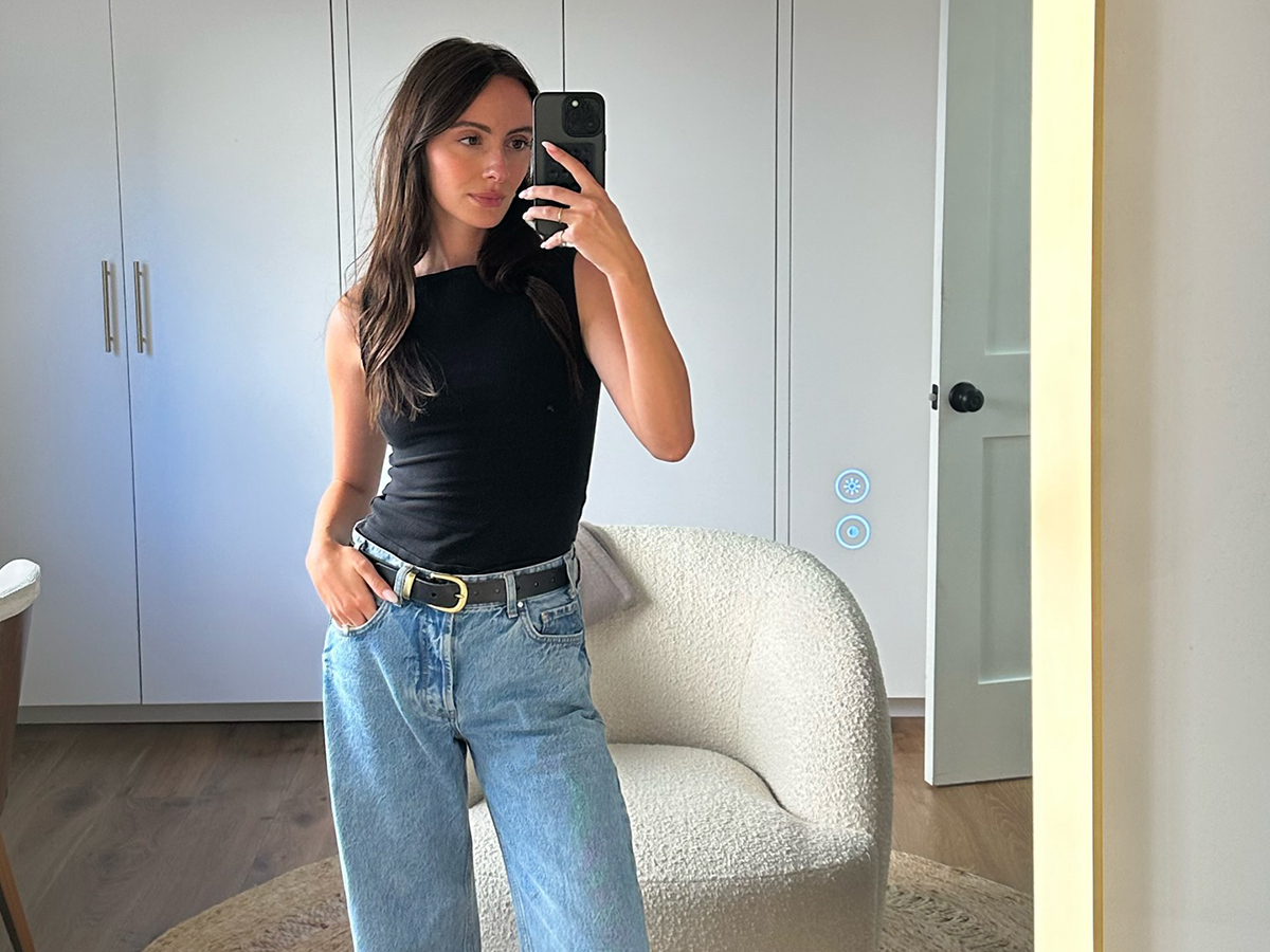 Influencer Liv Perez wearing a Reformation Dusk tank top and jeans