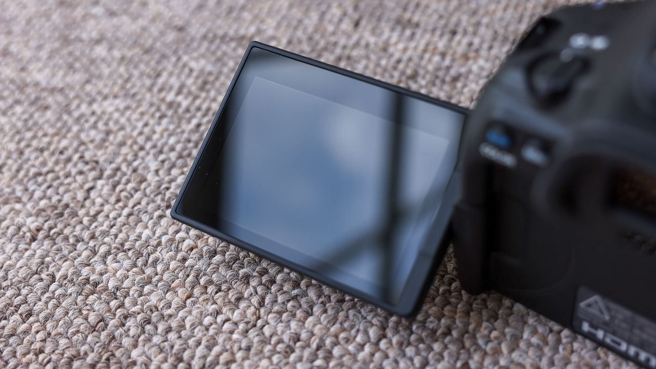 The fully articulating screen tilted diagonally on the Canon EOS R6 III.