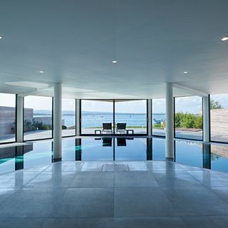 indoor pool with sea side view