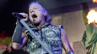 Bruce Dickinson onstage with Iron Maiden in 2023