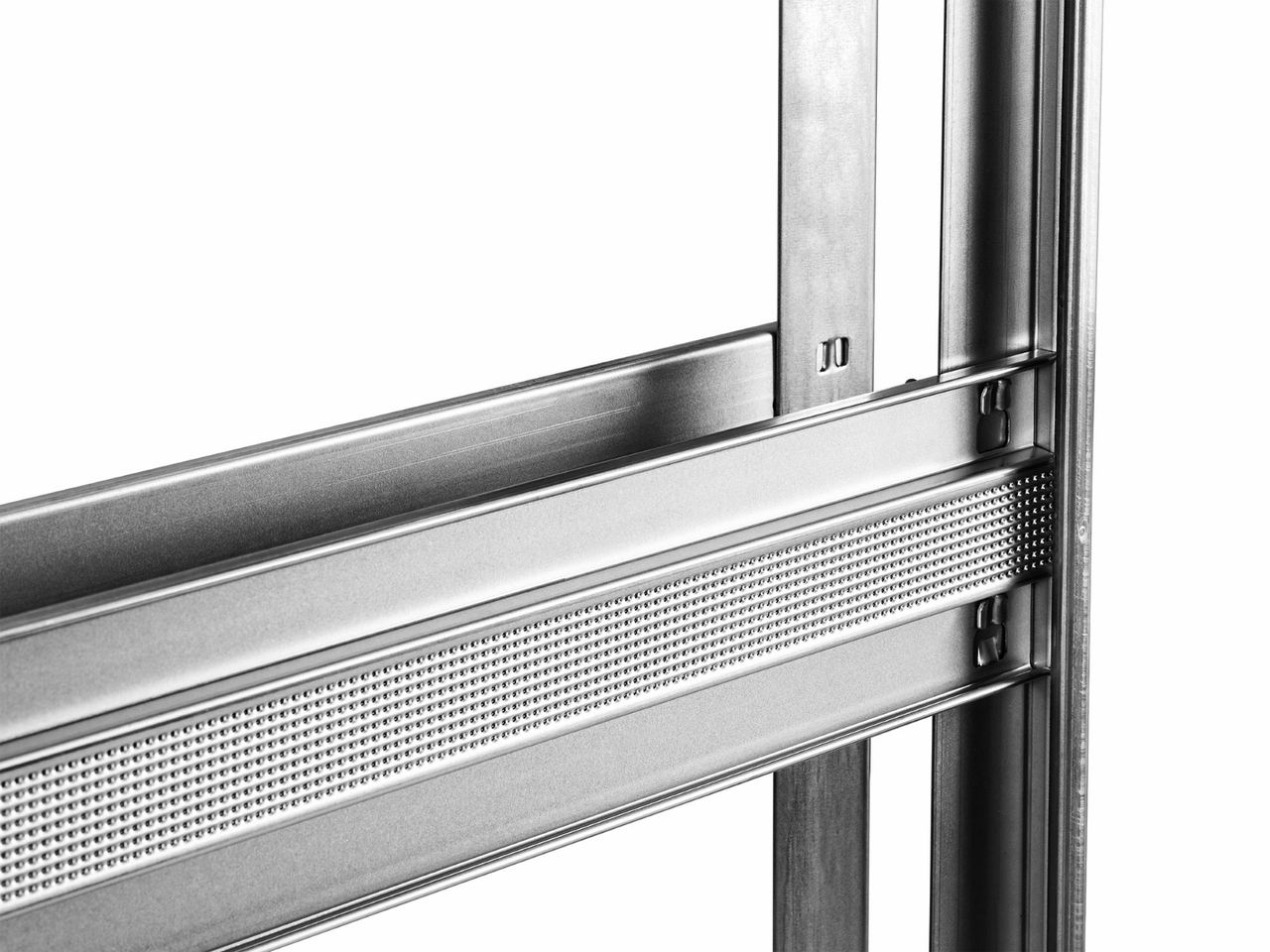 The metal frame of a pocket door close up