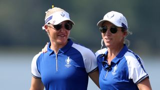 Charley Hull and Mel Reid converse at the Solheim Cup