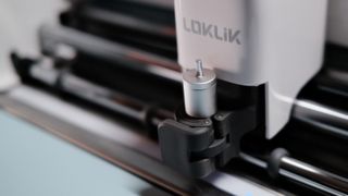 A loklik icraft machine on a desk