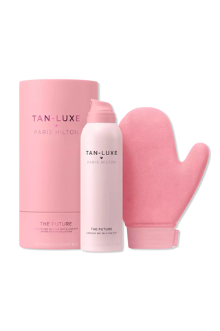 A bottle of Tan-Luxe The Future self-tanner set against a white background.