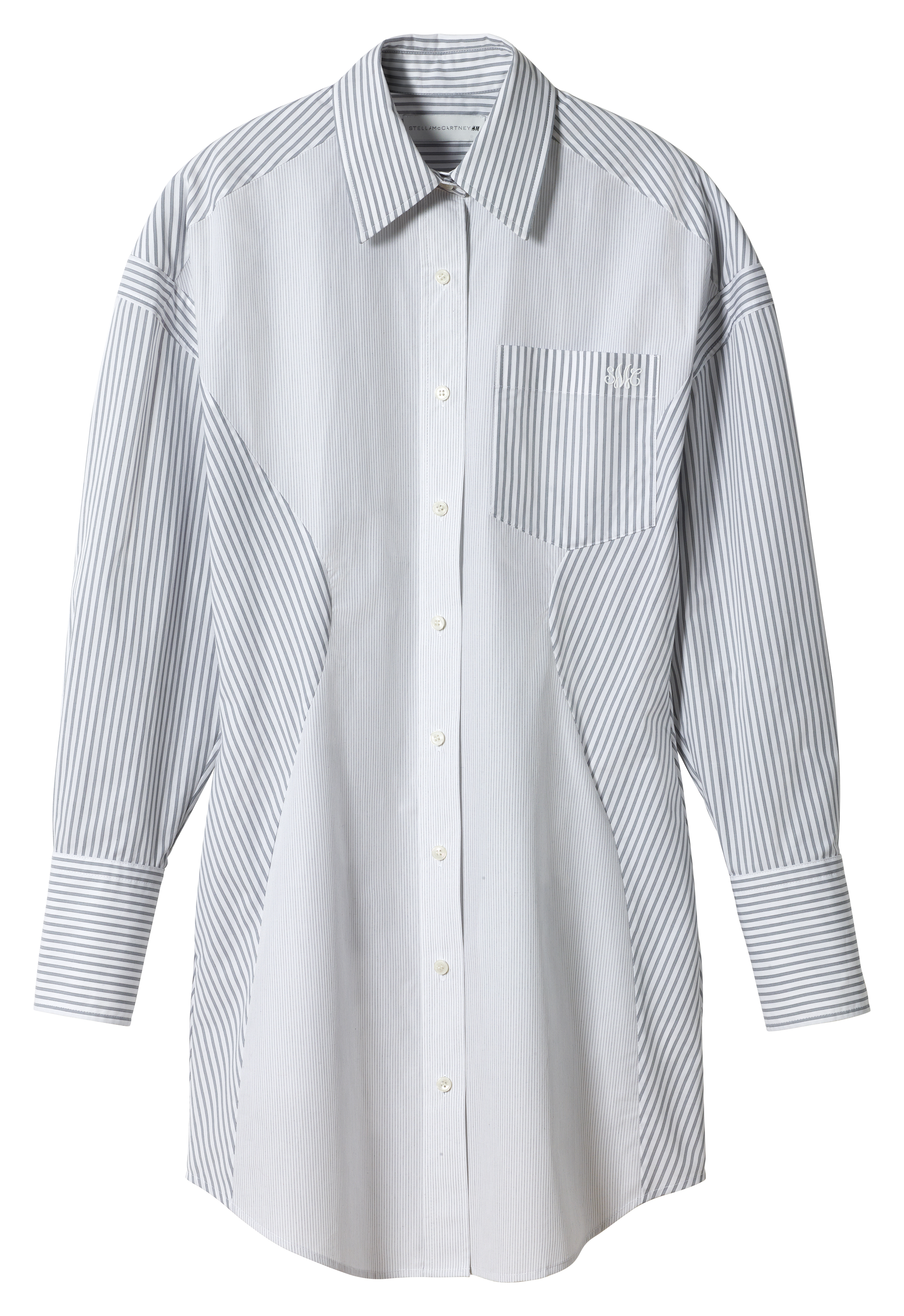 clothes from the H&M x Stella McCartney collaboration on a plain backdrop