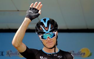 Chris Froome (Team Sky) waves to the crowd on the sign-in stage at the Vuelta a Espana