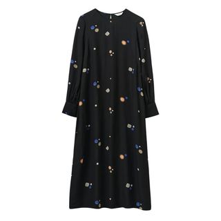 A cutout of the Toast Cosmic Dot Column dress on a white background