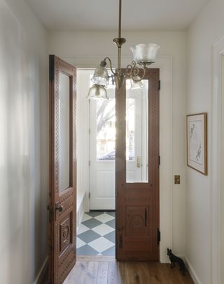 entry hallway with original wooden door
