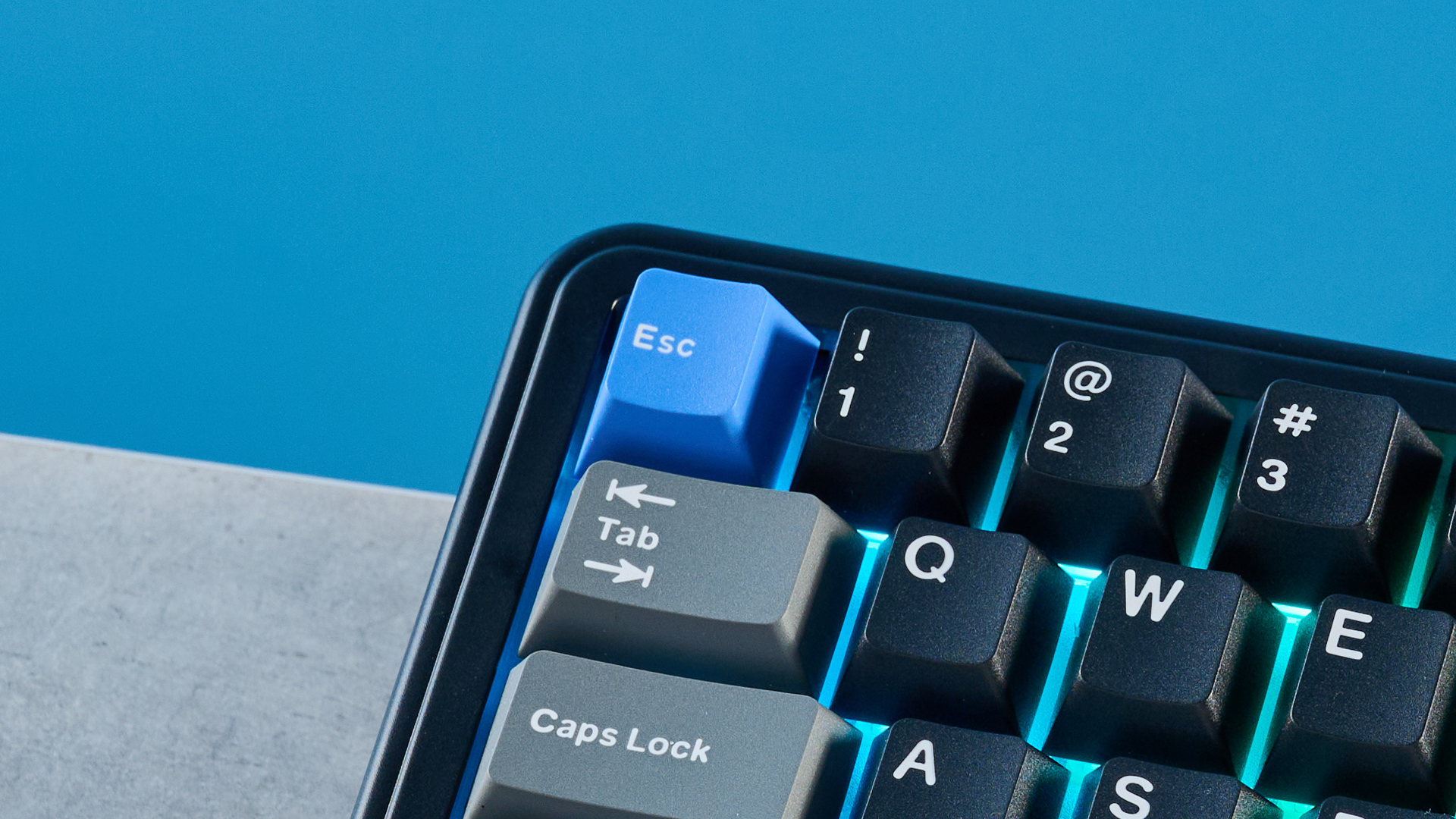 A black, gray and blue Epomaker HE65 Mag magnetic keyboard with Hall Effect switches