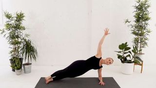 Evolve Pilates founder Veronique Ellis demonstrating a side plank