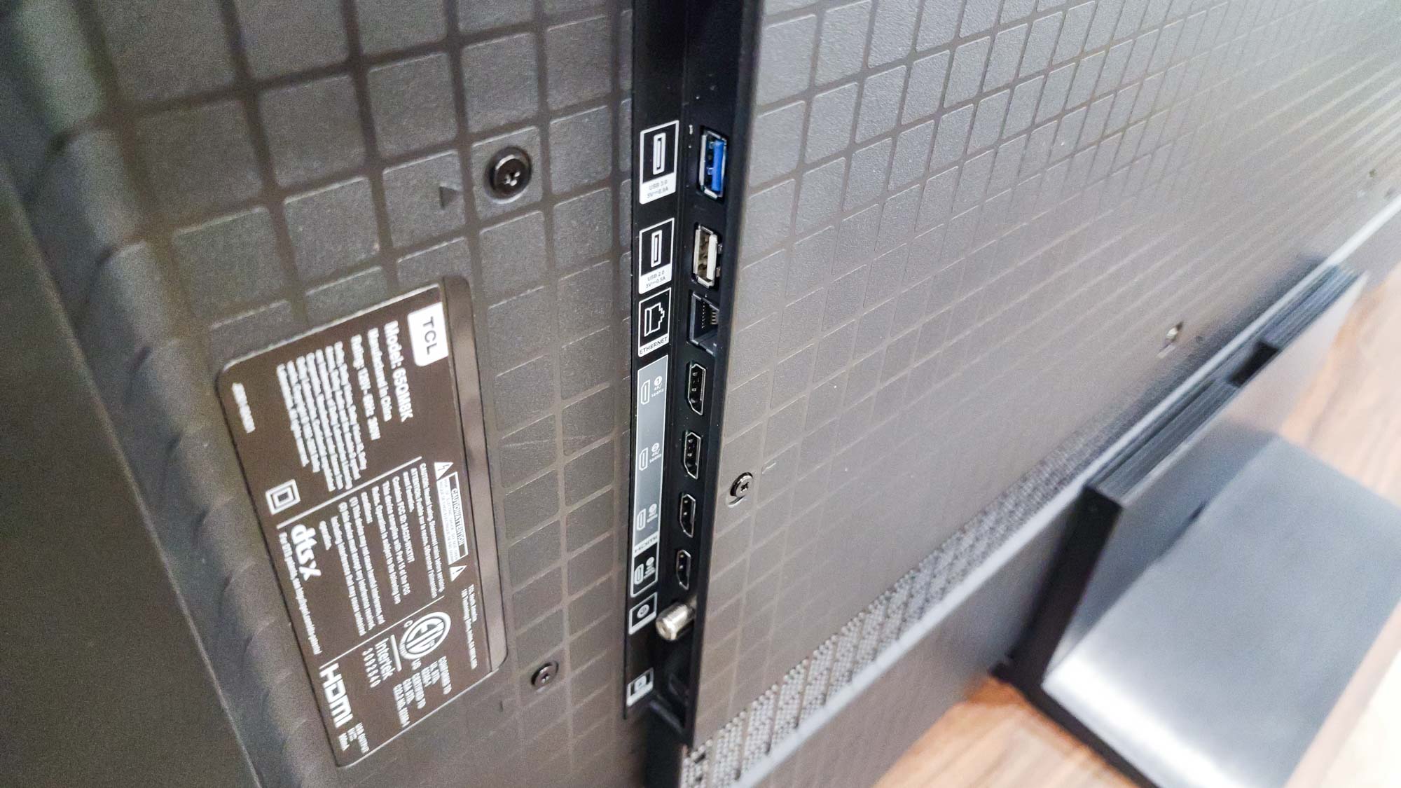 The ports on the back of a TCL QM8K QD-Mini LED TV.