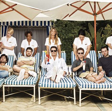men on lounge chairs