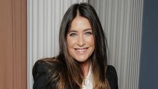 Lisa Snowdon wearing a black blazer and white shirt