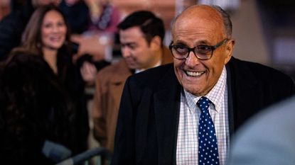 Rudy Giuliani arrives ahead of a campaign event with Trump in Manchester, New Hampshire, on Saturday, Jan. 20, 2024.