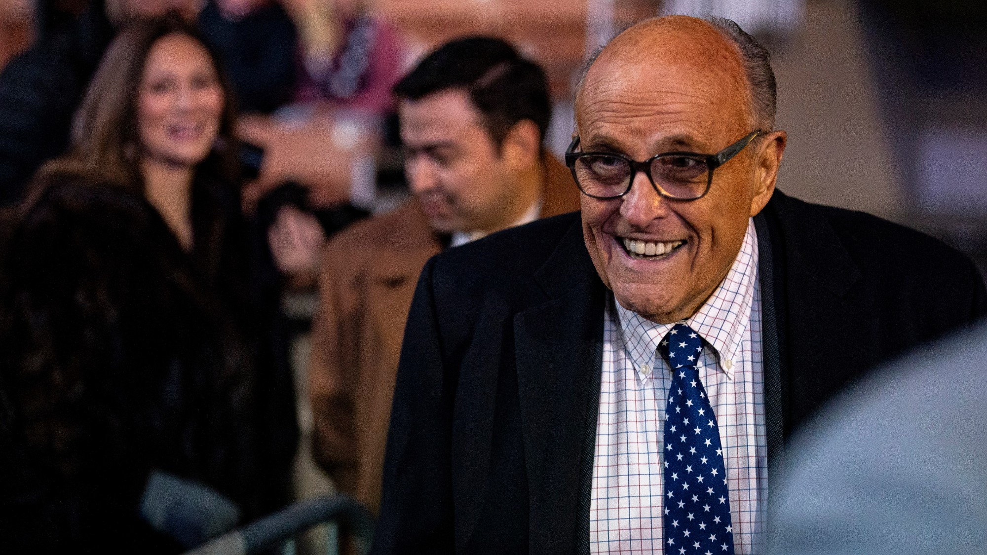 Rudy Giuliani arrives ahead of a campaign event with Trump in Manchester, New Hampshire, on Saturday, Jan. 20, 2024.