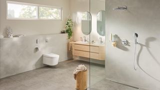 GROHE bathroom containing the GROHE Sensia Pro Shower Toilet Essence Basin Mixers And Concealed Smart shower