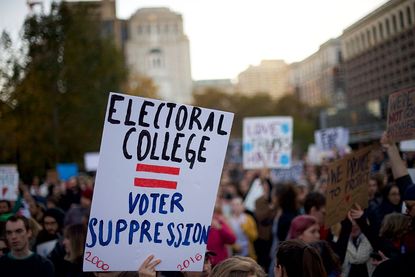 Protestors demonstrate against President-elect Donald Trump outside Independence Hall November 13, 2016 in Philadelphia, Pennsylvania