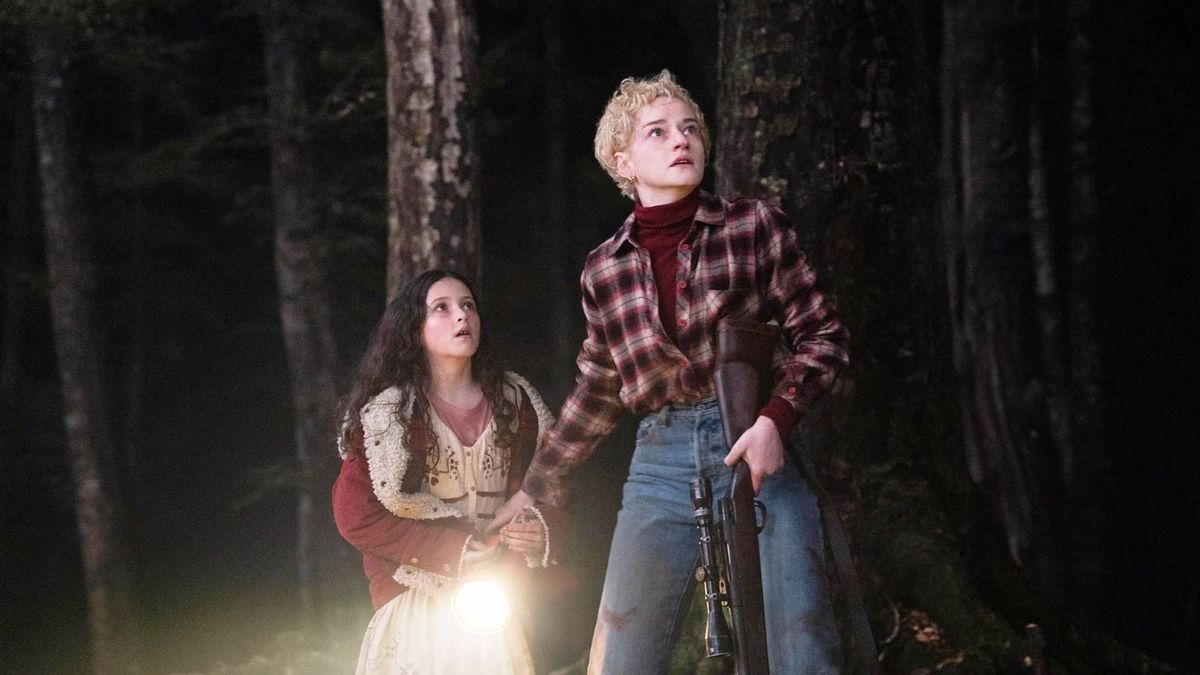 Matilda Firth and Julia Garner in &quot;Wolf Man&quot; (2025)