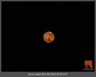 This still from a Slooh Space Camera webcast shows Mars as it appeared at opposition on March 3, 2012 at 11:30 p.m. ET (0430 GMT on March 4).