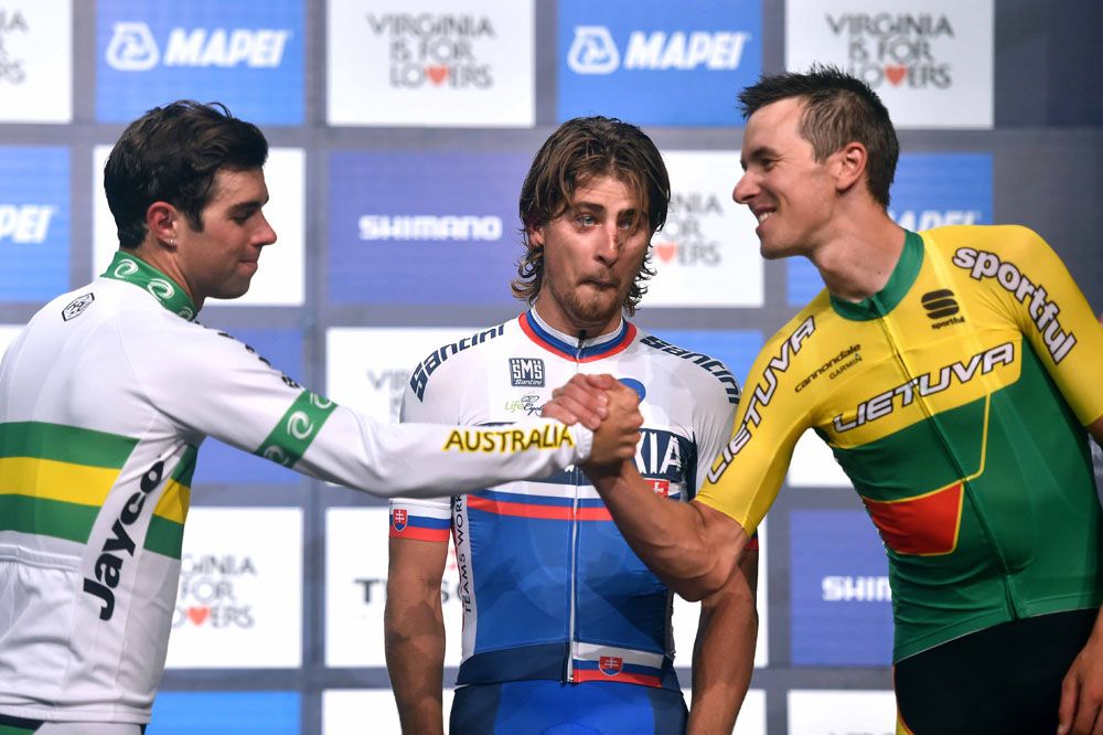 Silver medallist Michael Matthews congratulates Ramūnas Navardauskas for his bronze medal