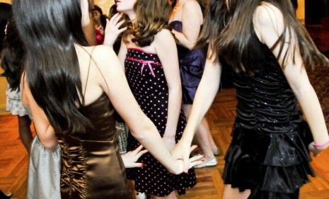 Teenagers decked out in minis with manicured nails dance at a bat mitzvah: Why do mothers encourage their 12- and 13-year-old daughters to dress so provocatively, asks Jennifer Moses in The W