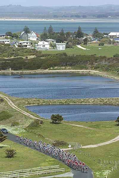 The peloton was still in pursuit of four riders with six laps to go on stage five.